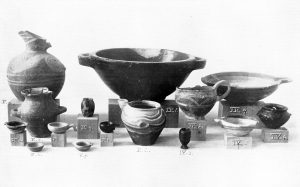 Stone and clay vases from Tombs IV and V. Scale about 1:4.